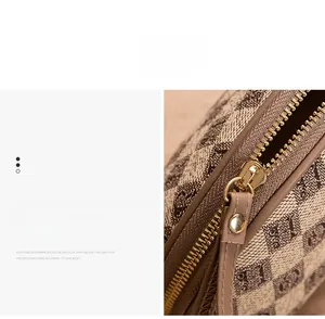 Detailed macro view of the premium gold zipper and luxury checkered pattern fabric