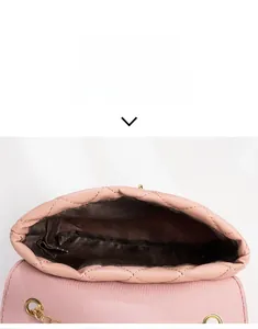 Pink quilted chain bag showing interior capacity and golden hardware details