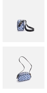 Detail of blue and white checkered underarm bag with black leather strap and gold hardware