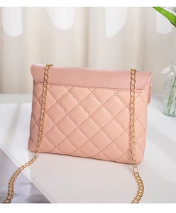 Close-up of pink quilted crossbody bag with gold chain strap and elegant flap design