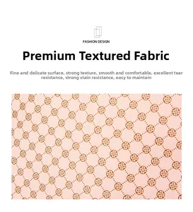 Macro detail of tear-resistant pink faux leather fabric with clover pattern for women backpacks