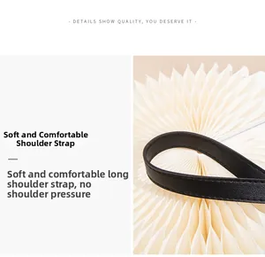 Close-up of a soft black faux leather shoulder strap with detailed texture and elegant design