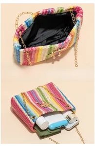 Spacious interior of rainbow woven bucket bag showing capacity for daily essentials
