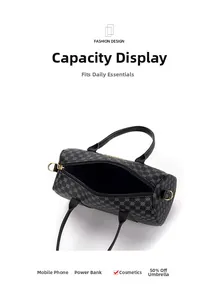 Internal view of a black Boston bag showing space for phone, makeup, and an umbrella