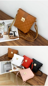 Detailed view of quilted bucket bags in brown, white, red, black, and pink with metal locks