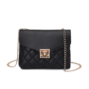 Classic black quilted crossbody bag with golden chain strap and metallic lock closure