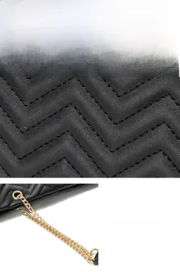 Detail of black chevron quilted leather bucket bag showing waterproof and wear-resistant fabric