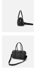 Detailed side view of vintage Boston bag featuring grey dot pattern and gold hardware
