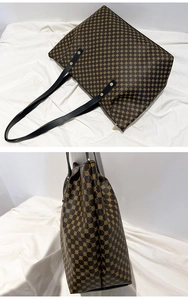 Close-up of geometric dot pattern tote bag with leather handles and gold rivet details