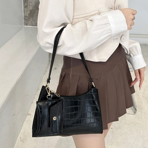 Black crocodile embossed baguette shoulder bag with matching mini pouch and gold hardware