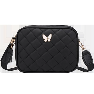 Quilted crossbody bag in black with white butterfly logo and adjustable textile strap