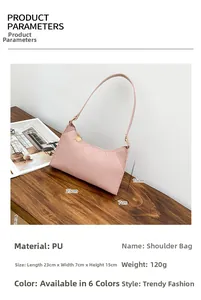 Pink quilted PU leather underarm bag featuring a textured rhombus pattern and top zipper