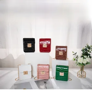 Detailed collection of small crocodile pattern crossbody bags in six vibrant colors
