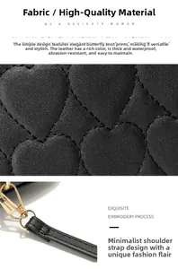 Close-up of black PU leather texture with heart quilting and waterproof surface