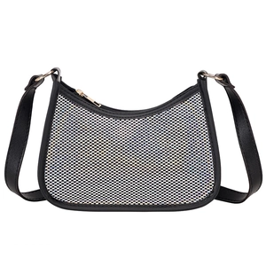 Sparkly black sequin underarm bag with shimmering crystals and golden zipper details