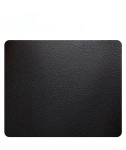 Detail of soft black litchi grain leather showing scratch-resistant texture of the shoulder bag