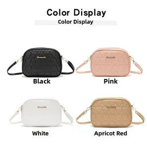 Compact heart-quilted crossbody bags shown in black, pink, white, and apricot colors