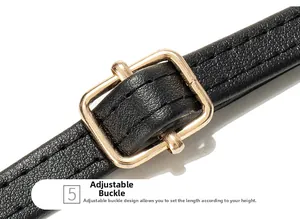 Close-up of black pebble leather strap with adjustable gold buckle for shoulder bag