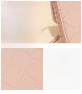 Close-up of fine diamond-quilted stitching and premium texture on light pink leather bag