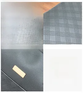 Detail of quilted leather texture and premium gold metal buckle on a large tote bag
