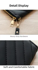 Close-up of black quilted leather texture and premium gold metal hardware on the wallet