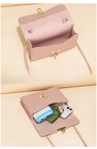 Pink quilted shoulder bag detail showing interior storage capacity for essentials