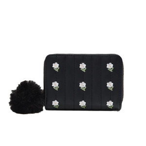 Mini black zipper purse with white floral embroidery and a plush pompom pendant
