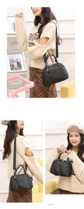 Detail of black shell-shaped tote with diamond quilted pattern and a small round coin pouch