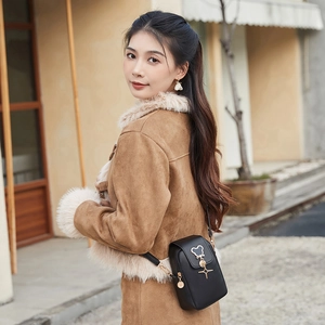 Cute black faux leather mini crossbody phone bag with gold bear hardware and star pendant