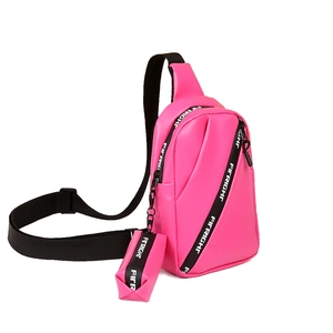 Hot pink PU leather sling bag set with wide adjustable strap and round coin pouch
