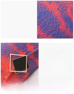 Detailed close-up of snake texture gradient material and gold metal buckle on woman bag