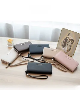 Litchi pattern leather long wallets for women in six colors on wooden desk
