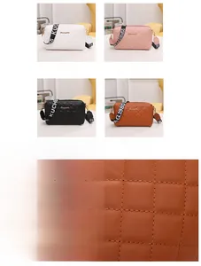 Detailed view of quilted faux leather texture and metallic logo on women handbags