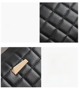 Detail of black quilted leather texture and premium gold geometric metal hardware