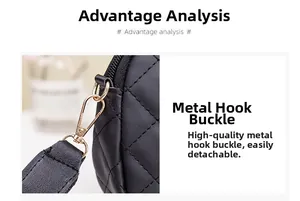 Detail of golden lobster clasp and quilted black leather strap on a camera bag