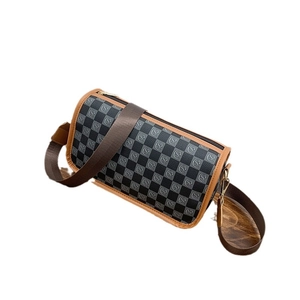Retro cylinder crossbody bag featuring black and grey checkerboard print and brown trim