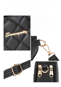 Détails du sac matelassé noir avec fermeture éclair en cœur et logo métallique