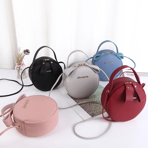 Sac Bandoulière Rond Pour Femmes Cuir PU Grain Litchi Sac À Main Cercle Décontracté Avec Nœud Logo En Métal Doré Petit