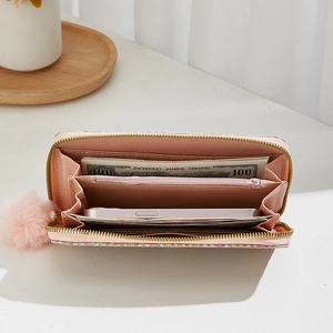 Portefeuille long rose tissé pour femme avec pompon et compartiment pour smartphone