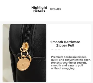 Close-up of golden hardware pull head and smooth zipper on black quilted bag