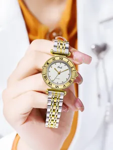 Detailed close-up of a luxury two-tone steel watch with Roman numerals and quartz dial