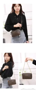 Detailed views of a mini brown chain crossbody bag with repetitive clover pattern and gold strap