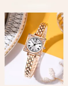 Detail view of a vintage square quartz watch for women with roman numerals and diamonds