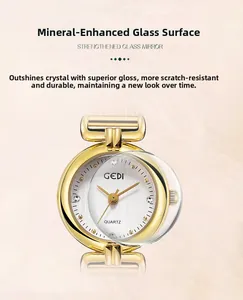 Macro detail of mineral crystal watch face with scratch-resistant glass and rhinestone markers