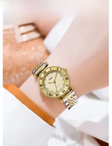 Close-up of a women's gold and silver steel watch with a Roman numeral bezel and champagne dial