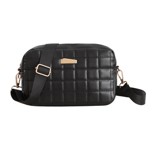 Fashionable black quilted crossbody camera bag with gold hardware and wide shoulder strap