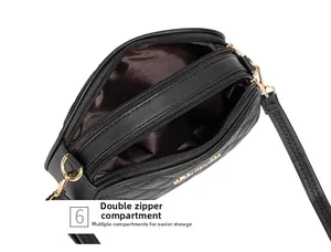 Détail du sac bandoulière matelassé noir avec compartiments à double fermeture