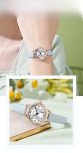 Close-up of a GEDI women's watch with light blue leather strap and rose gold case