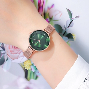 Women's minimalist watch with rose gold mesh band and emerald green dial