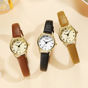 Détail de trois montres GEDI à quartz vintage avec bracelets cuir serpent et cadran romain